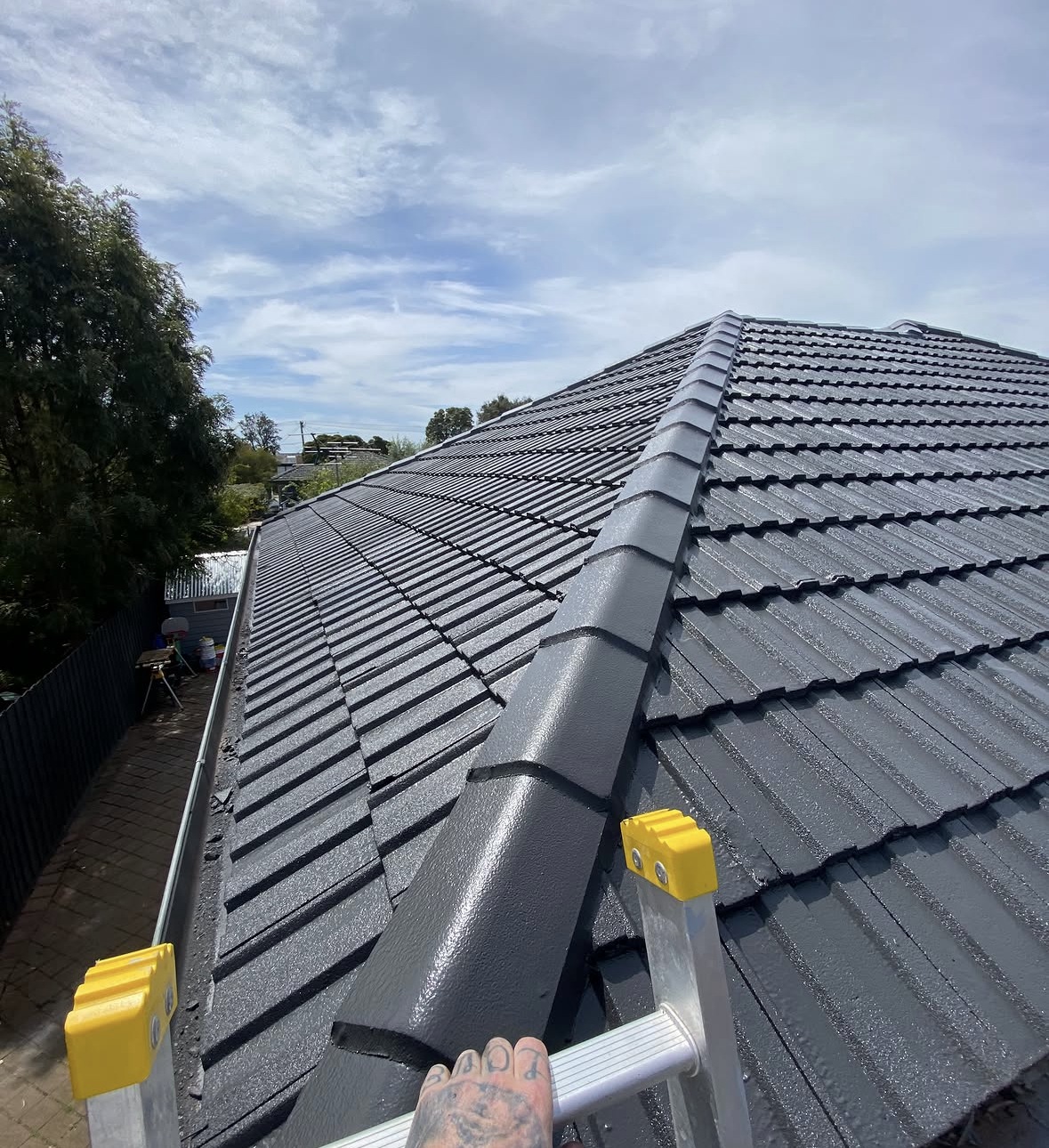 Restored tile roof viewed along the ridge in Melbourne