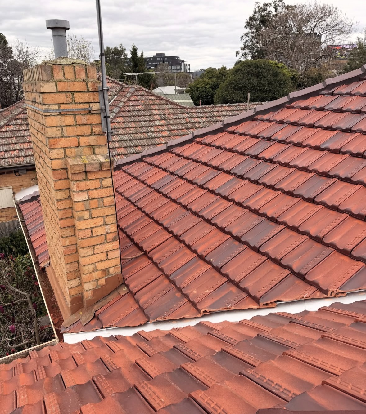 Close view of the new terracotta tiles beside the chimney